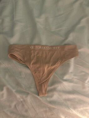 NWOT Victoria's Secret Nude Beige Thong Panty Size Small